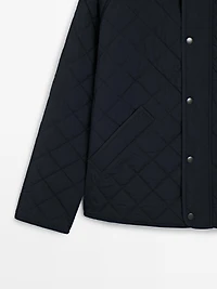 Veste matelassée col en velours côtelé