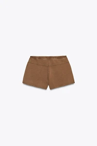 WASHED EFFECT STUDDED SHORTS