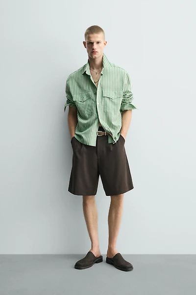 RELAXED FIT PLEATED SHORTS