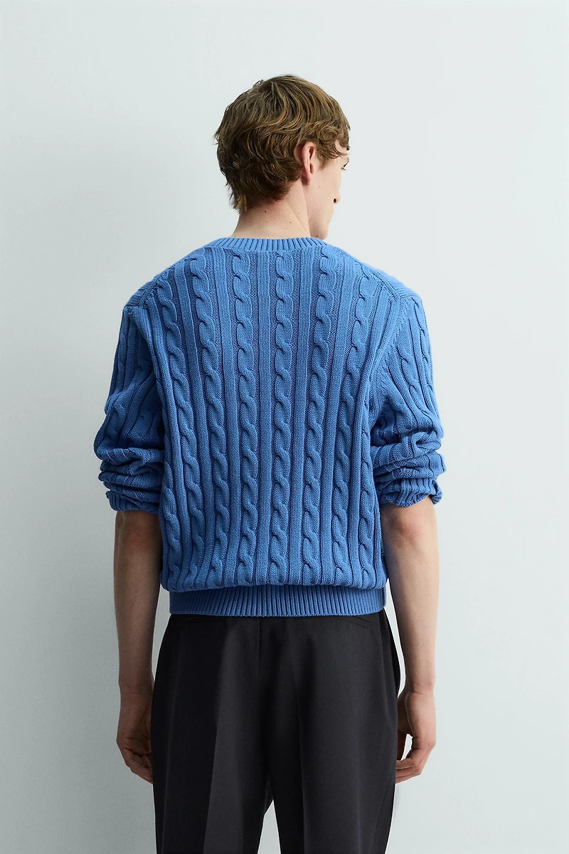 PULL STRUCTURÉ À TORSADES