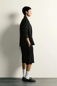 TEXTURED RELAXED FIT SHORTS