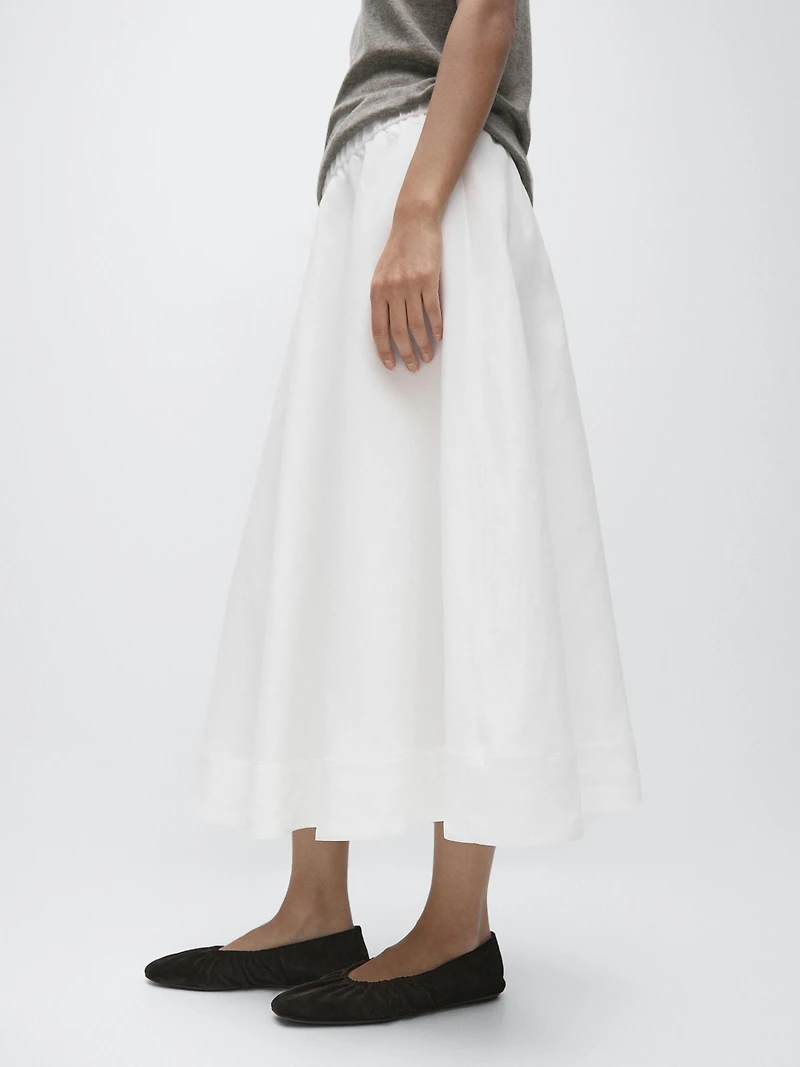 Flowing midi skirt with elastic detail