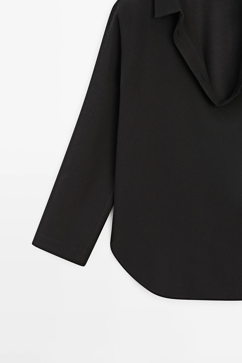 Flowing cotton blend V-neck shirt