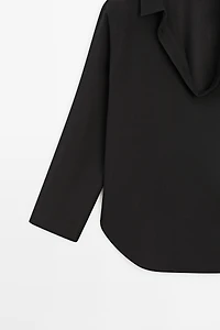 Flowing cotton blend V-neck shirt