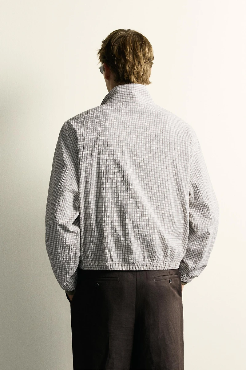 BLOUSON COURT À CARREAUX