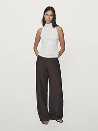 Top en maille à encolure américaine finition métallisée