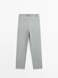 Flowing trousers with darts