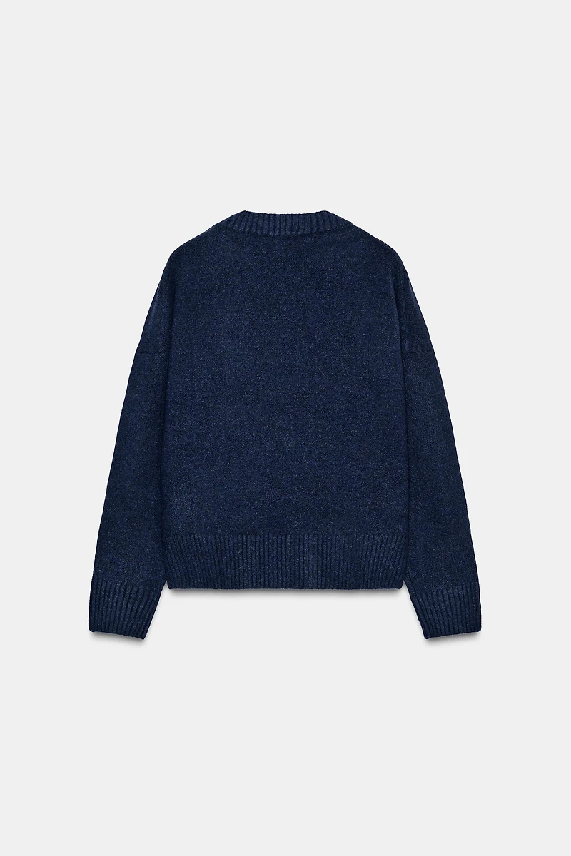 PULL DOUX EN MAILLE COL V