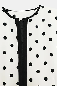 VESTE COURTE À POIS