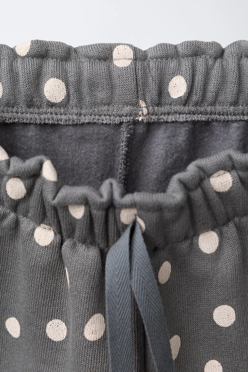 PANTALON EN MOLLETON IMPRIMÉ À VOLANTS