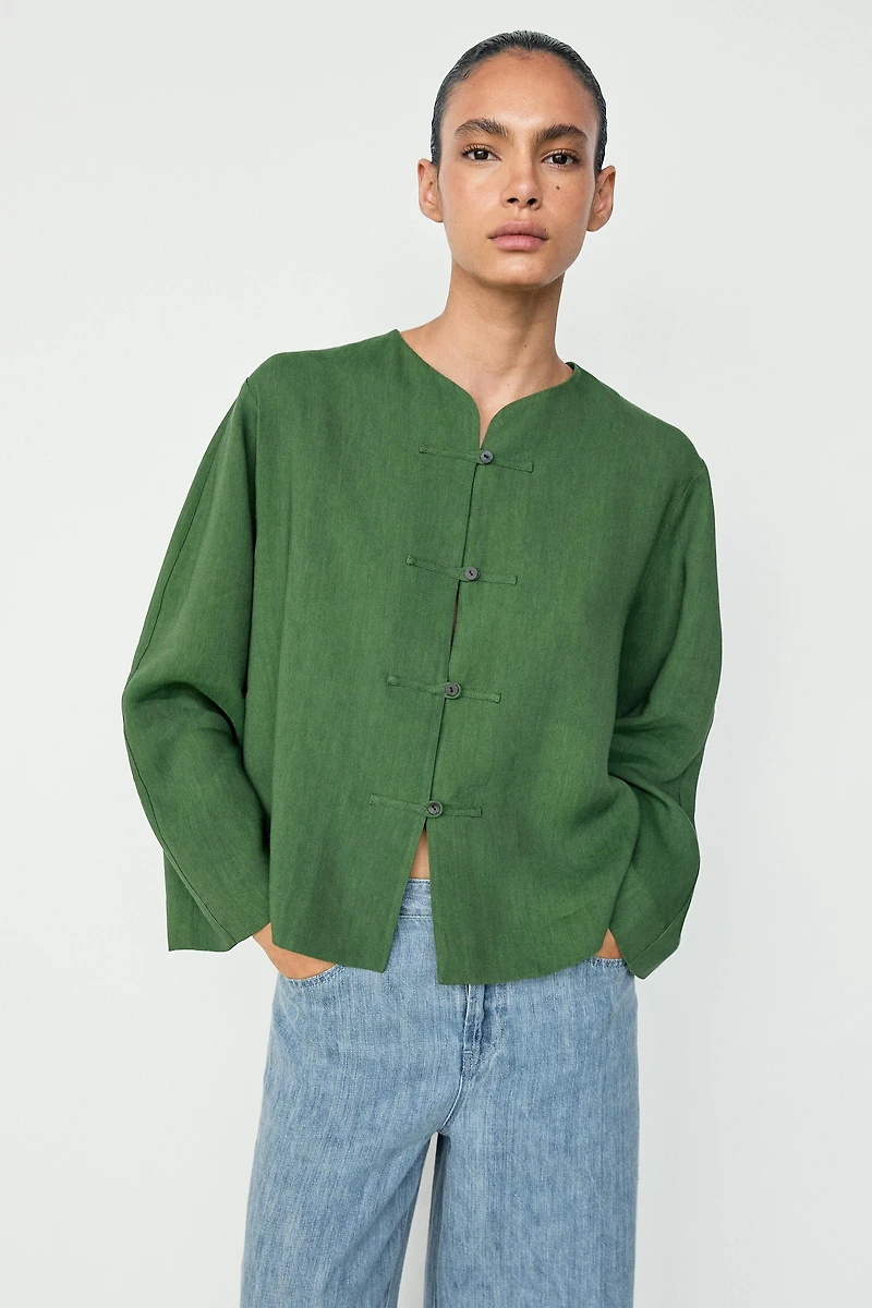 Fluid overshirt with button details total look