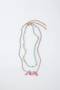 PACK OF TWO BEADED DOLPHIN NECKLACES