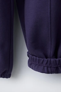 PANTALON DE JOGGING EN MOLLETON AVEC INSCRIPTION BRODÉE
