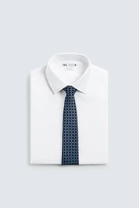 100% SILK GEOMETRIC JACQUARD TIE