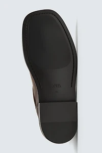 LIMITED EDITION BUCKLED LEATHER BOOTS