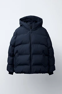 MANTEAU REMBOURRÉ ÉTIQUETTE DÉPERLANT