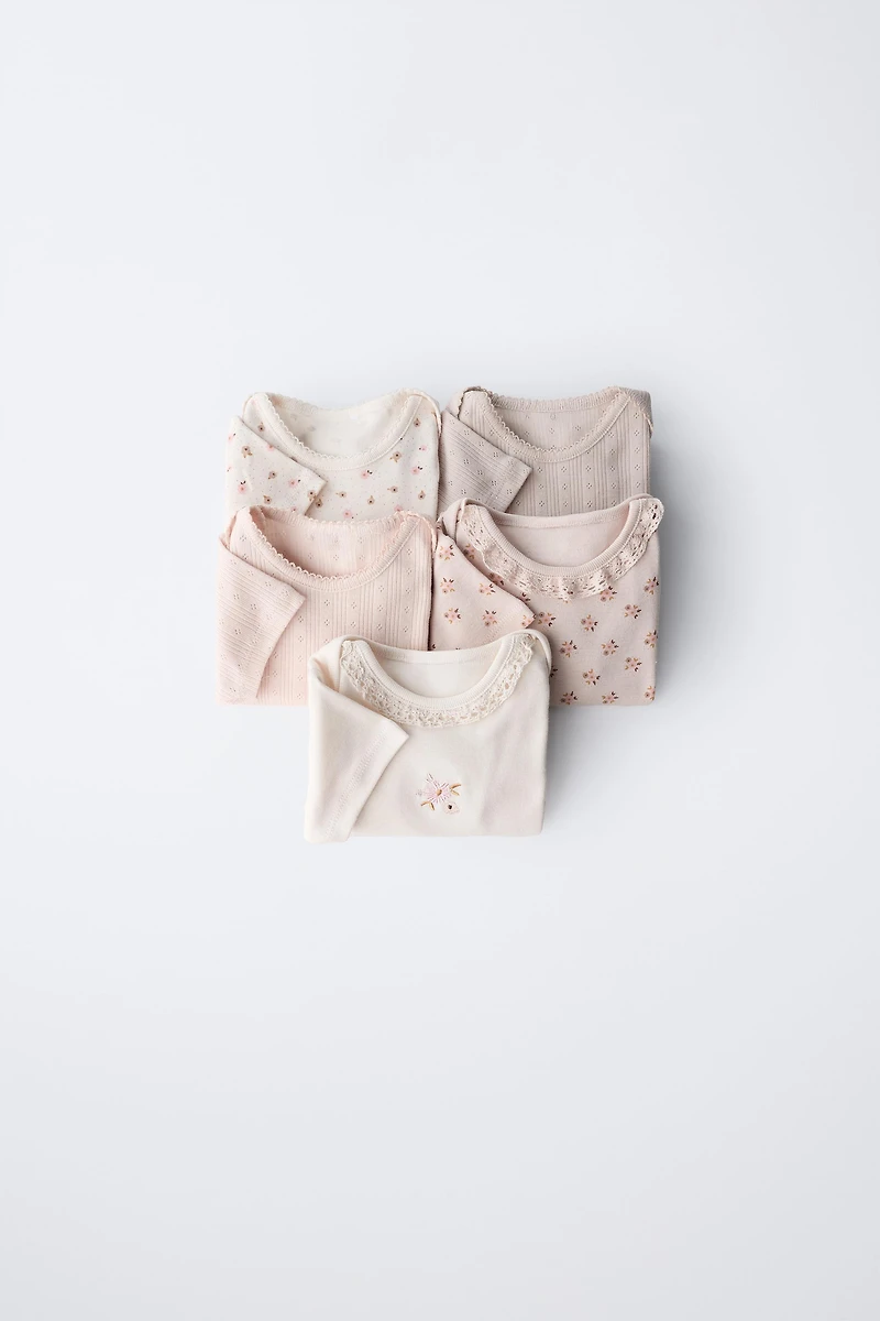 FIVE-PACK OF FLORAL BODYSUITS