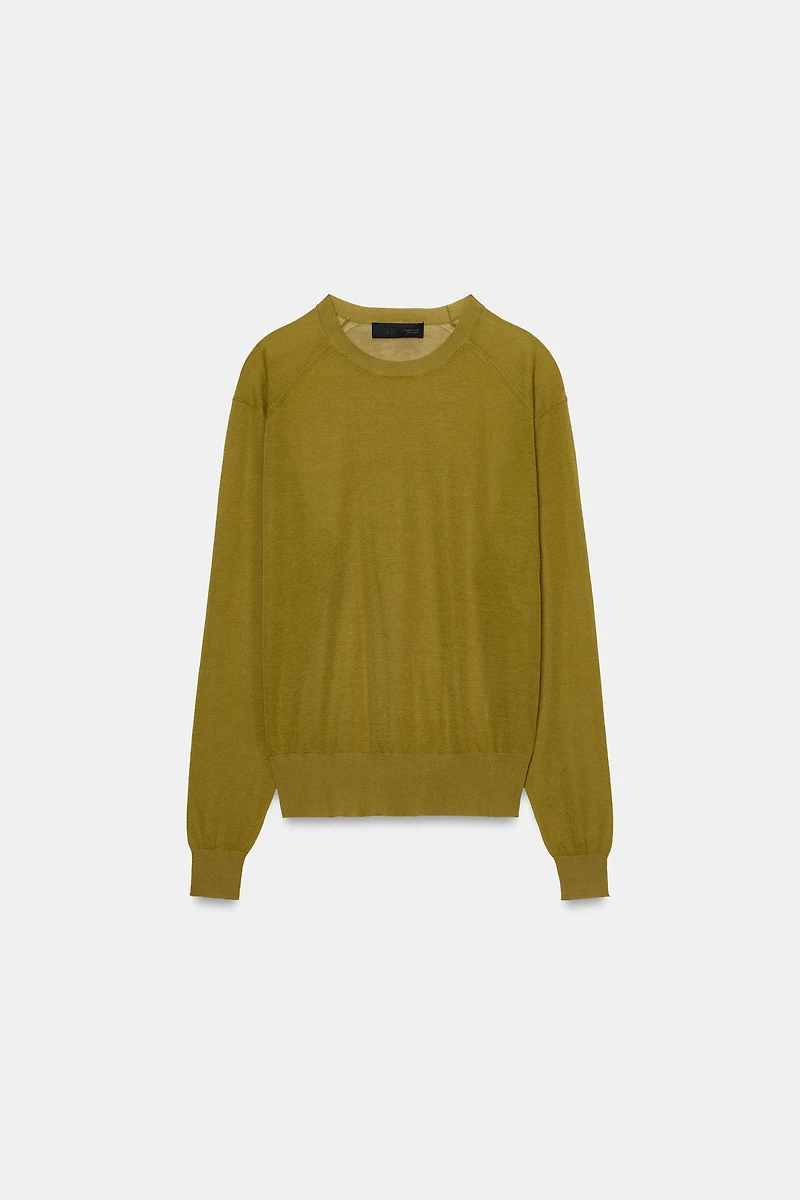 PULL EN MAILLE AVEC COUTURES AUX ÉPAULES