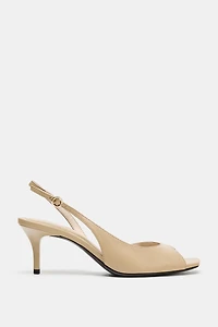 ASYMMETRIC HEELED SANDALS