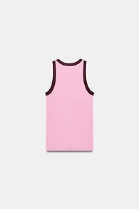 TOP EN MAILLE À ENCOLURE AMÉRICAINE