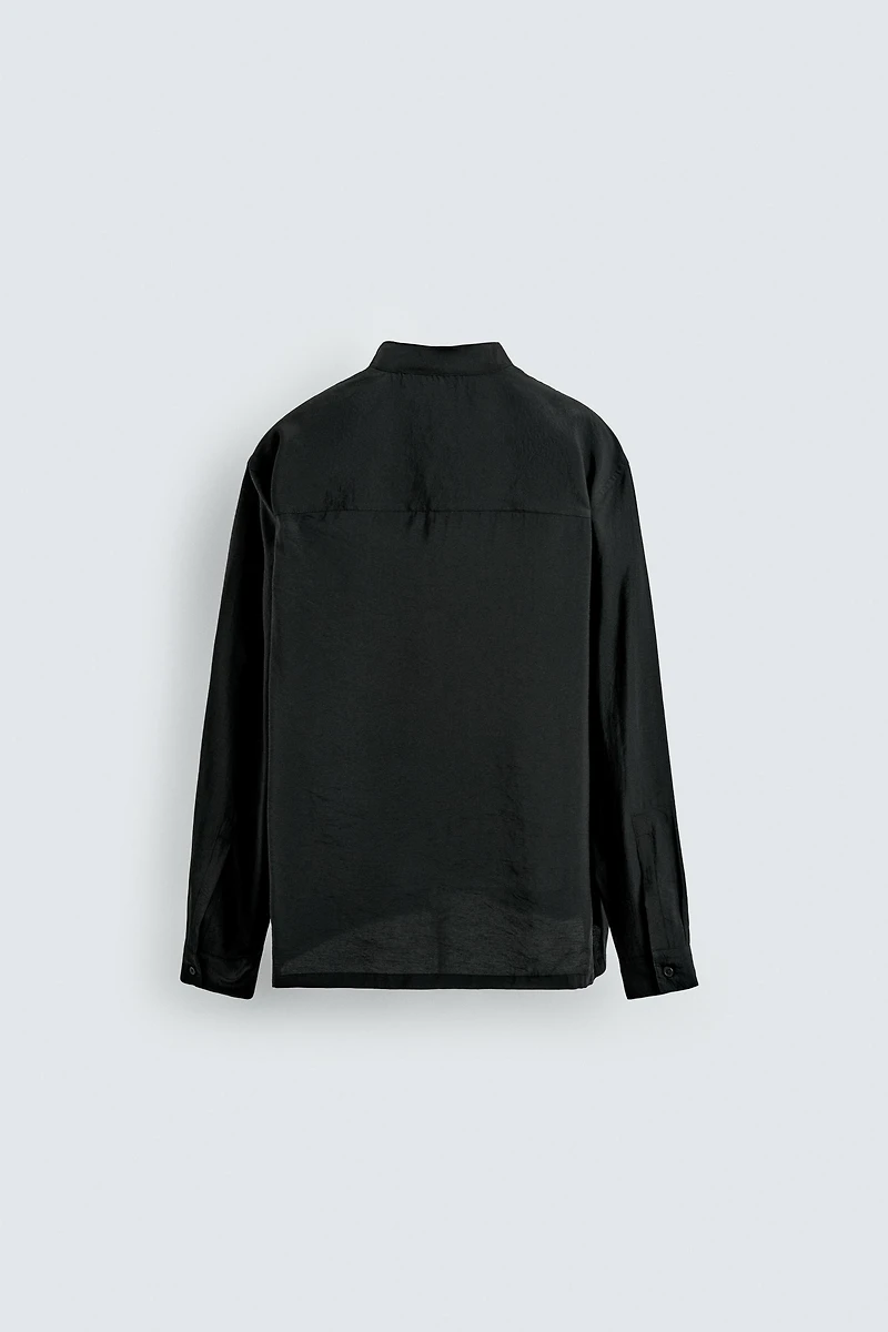 FLOWY POLO SHIRT