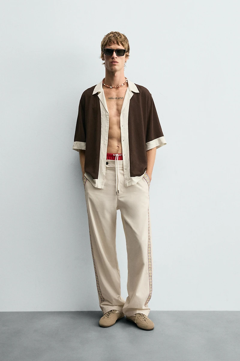 PANTALON BANDE BRODÉE
