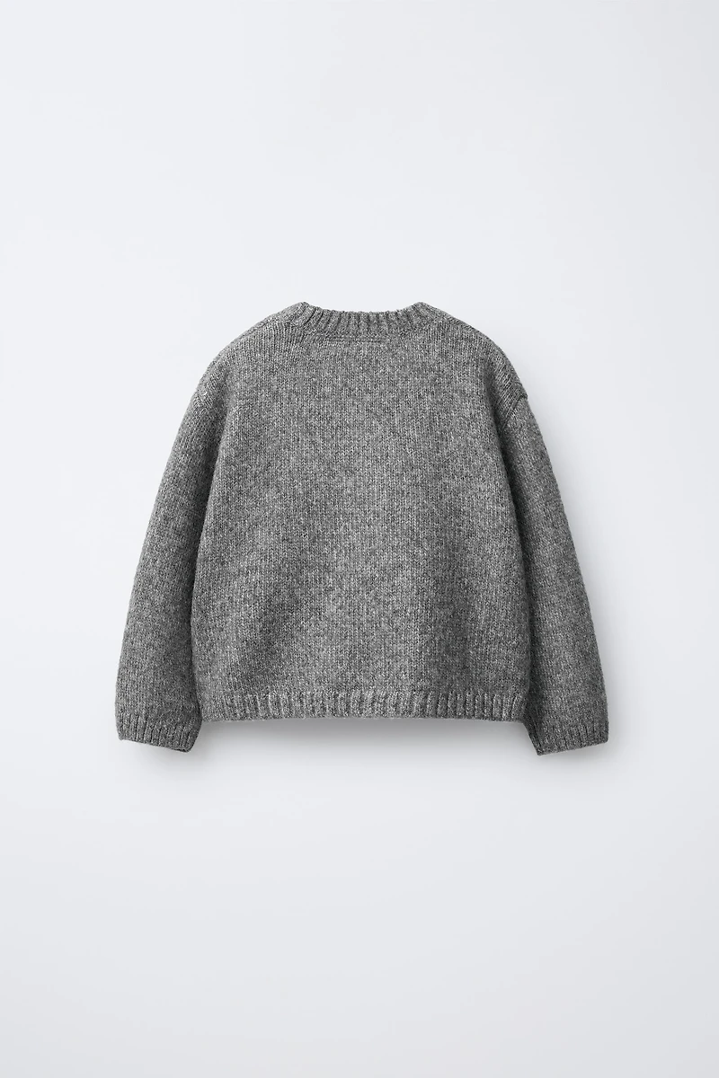 EMBROIDERED KNIT SWEATER