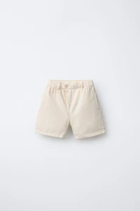 CRISS-CROSS WAIST SHORTS