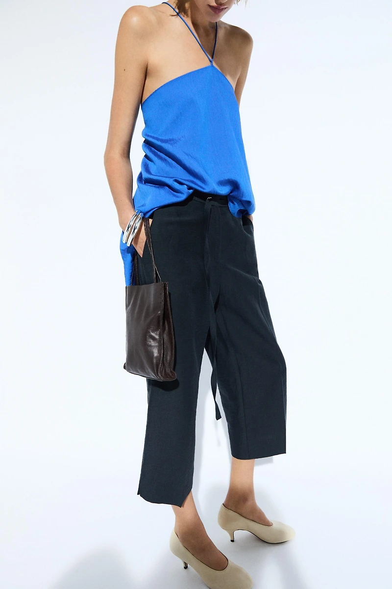 Flowing halter top with tie detail