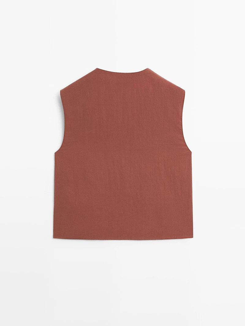 Blouse boutonnage côté argenté