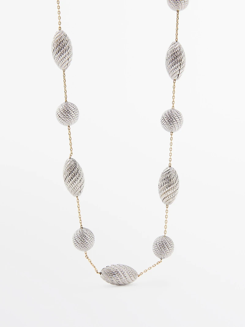 Collier texturé pièces ovales