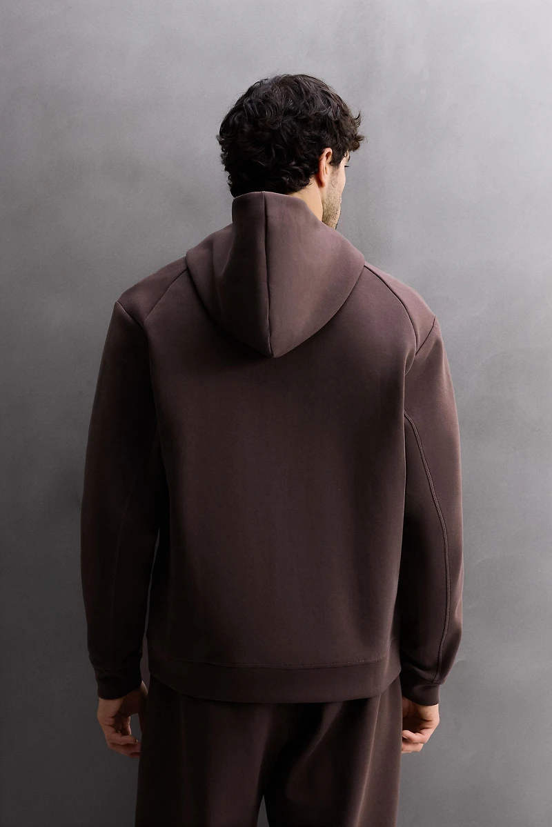 SWEAT TECHNIQUE À CAPUCHE ZIPPÉ