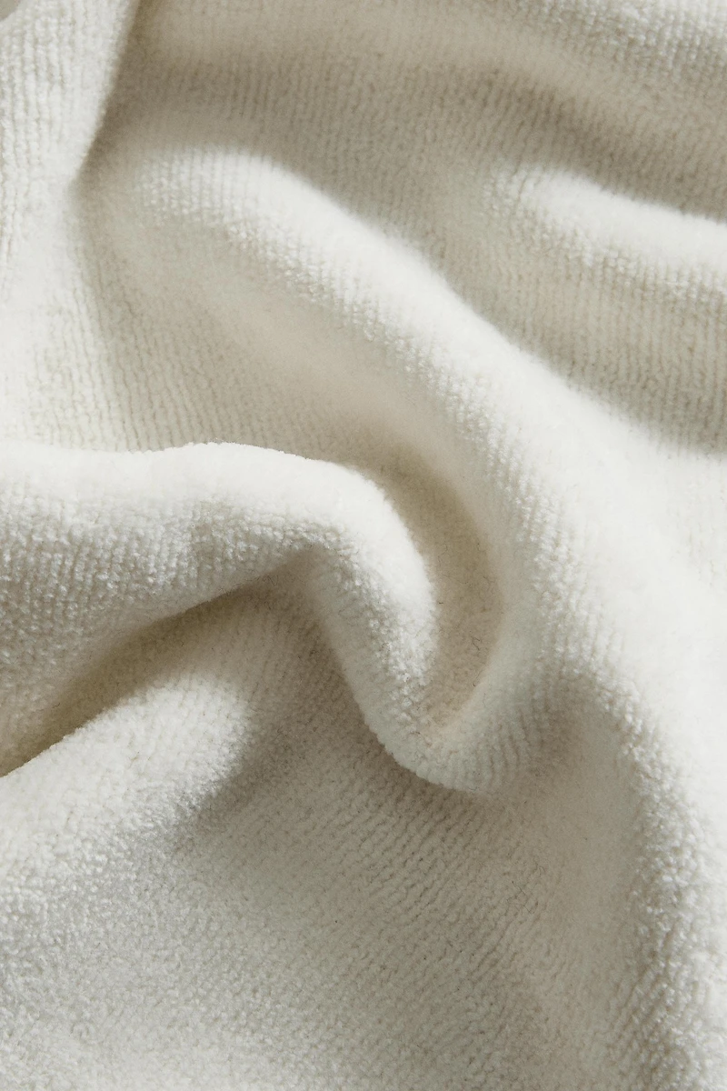VELOUR OVERLOCK BATH TOWEL