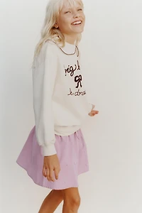 PEARL TRIM RUFFLED SKORT
