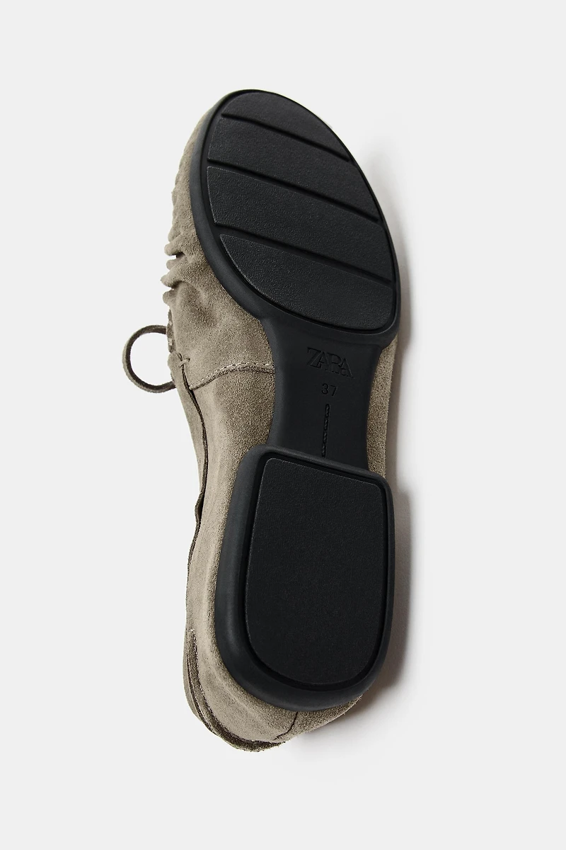 SPLIT LEATHER TASSEL LOAFERS