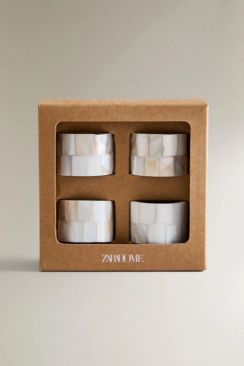 SET OF MOTHER-OF-PEARL NAPKIN RINGS (SET OF 4)