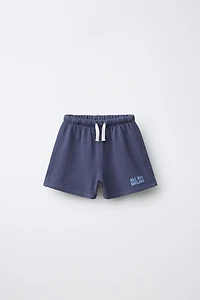 PLUSH TEXT SHORTS