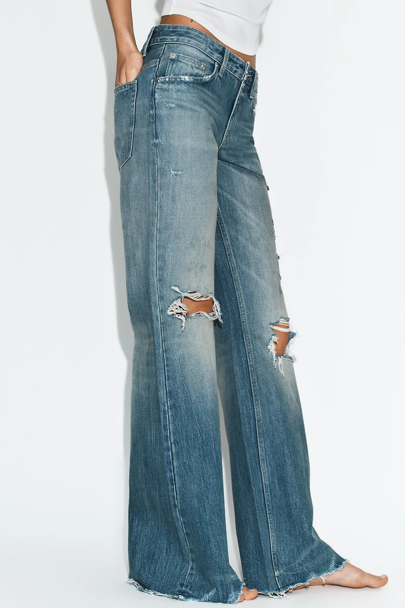 JEAN TRF FLARE DÉCHIRÉ TAILLE MOYENNE