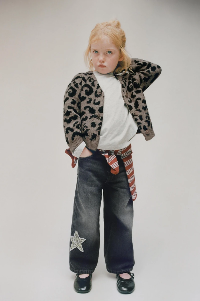 ANIMAL PRINT STAR PATCH WIDE LEG JEANS