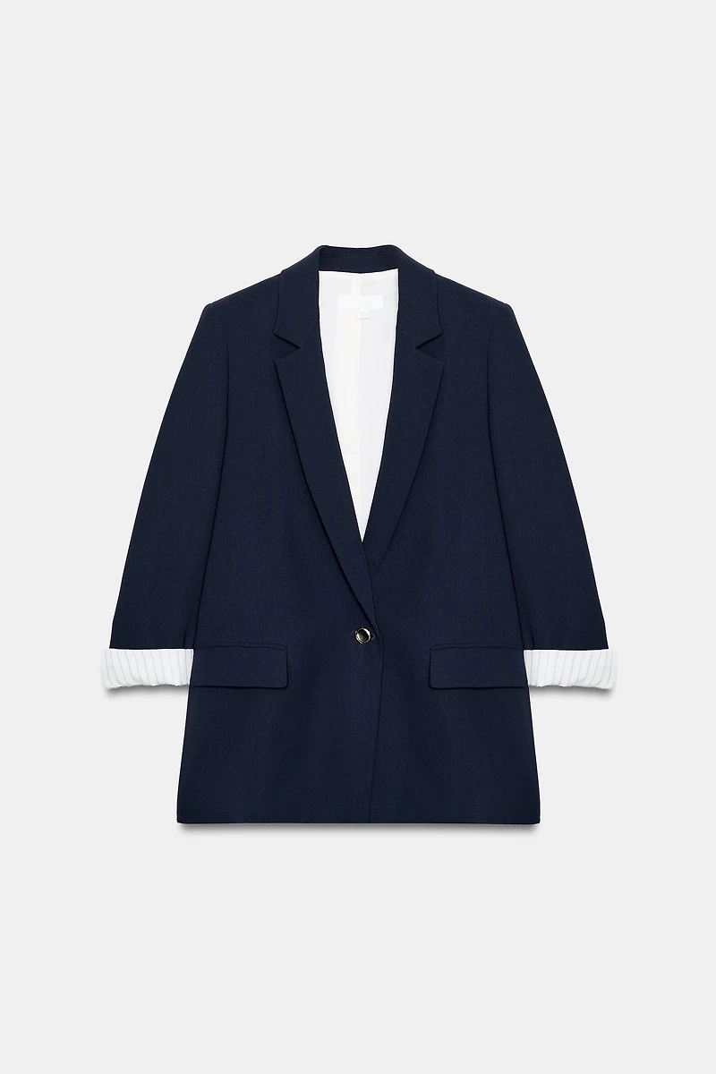 VESTE À MANCHES RETROUSSÉES ET POIGNETS IMPRIMÉS