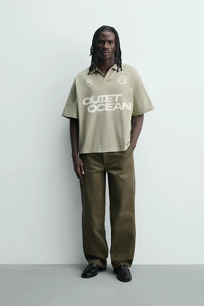 RELAXED FIT PRINTED TEXT POLO SHIRT
