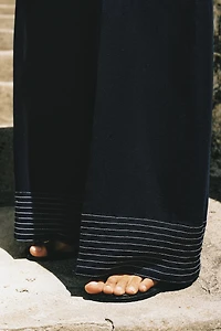 CONTRAST PIPING HALTER JUMPSUIT
