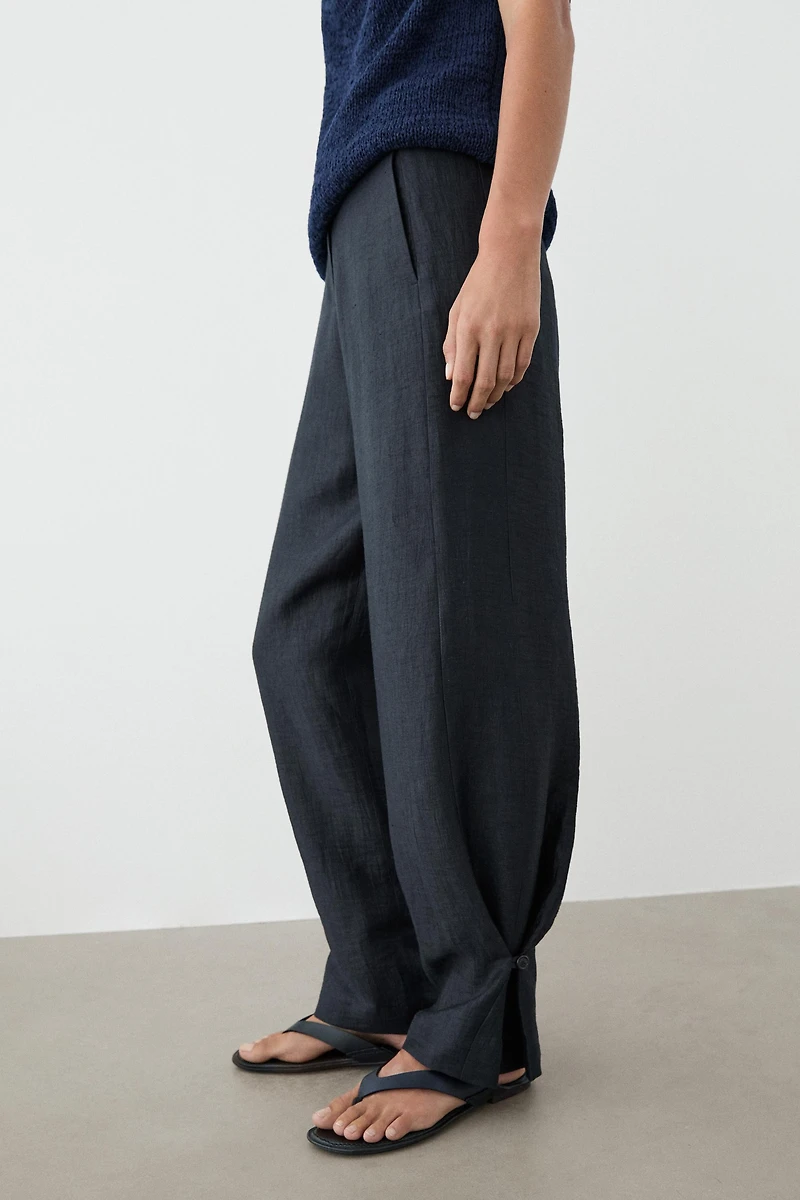 Pants with gathered hem detail
