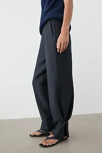 Pants with gathered hem detail