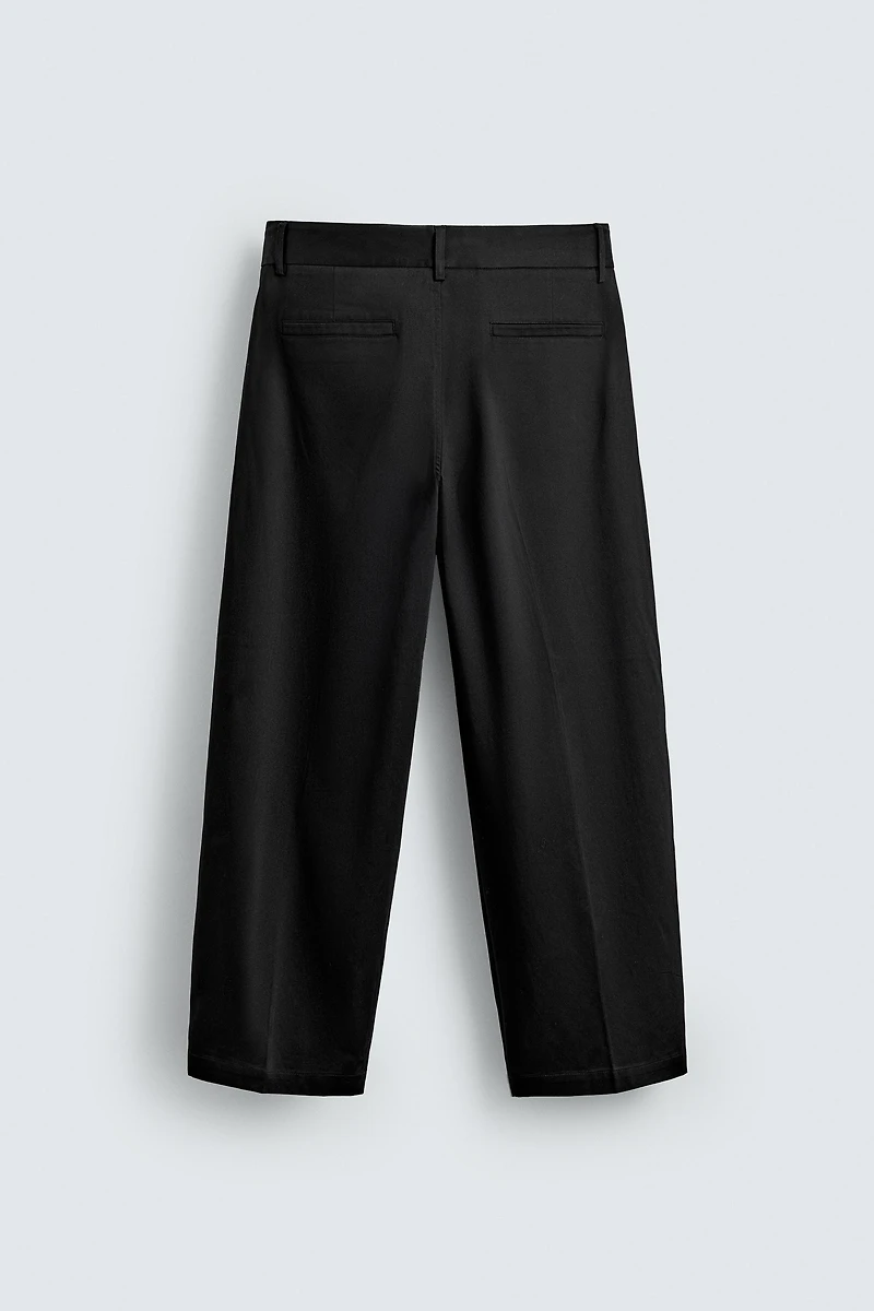 RELAXED FIT PLEATED PANTS
