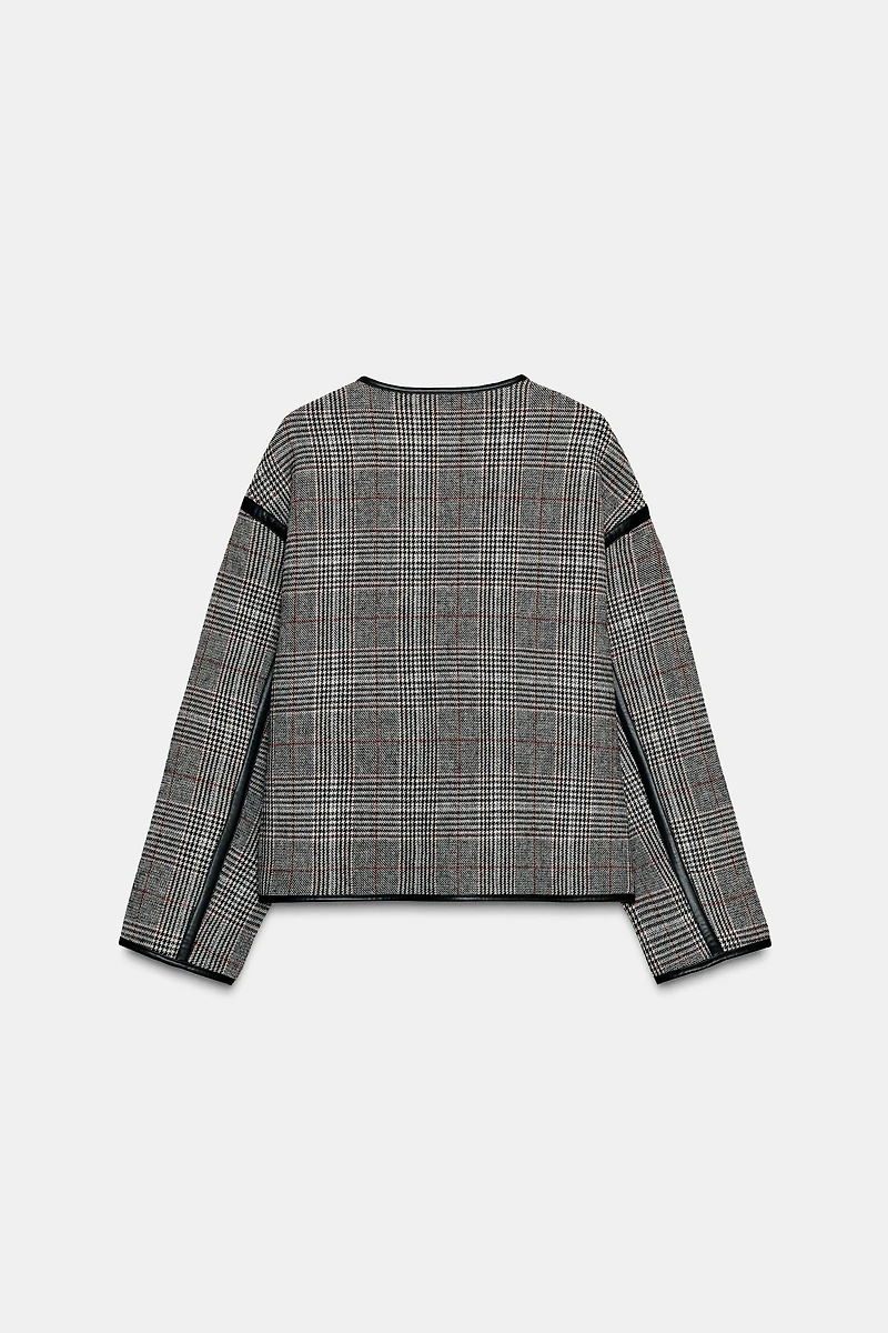 REVERSIBLE FAUX LEATHER PIPING JACKET