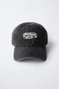 WASHED EFFECT EMBROIDERED TEXT CAP