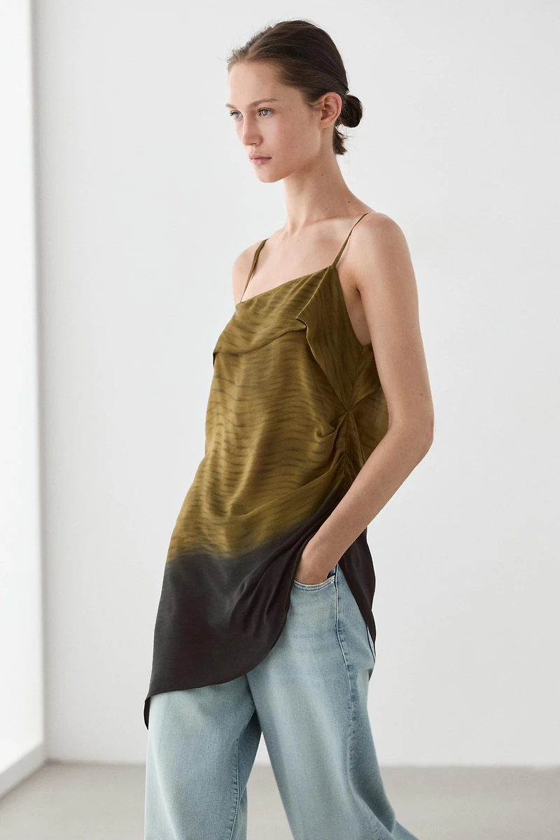 Asymmetric strappy top with draped detail