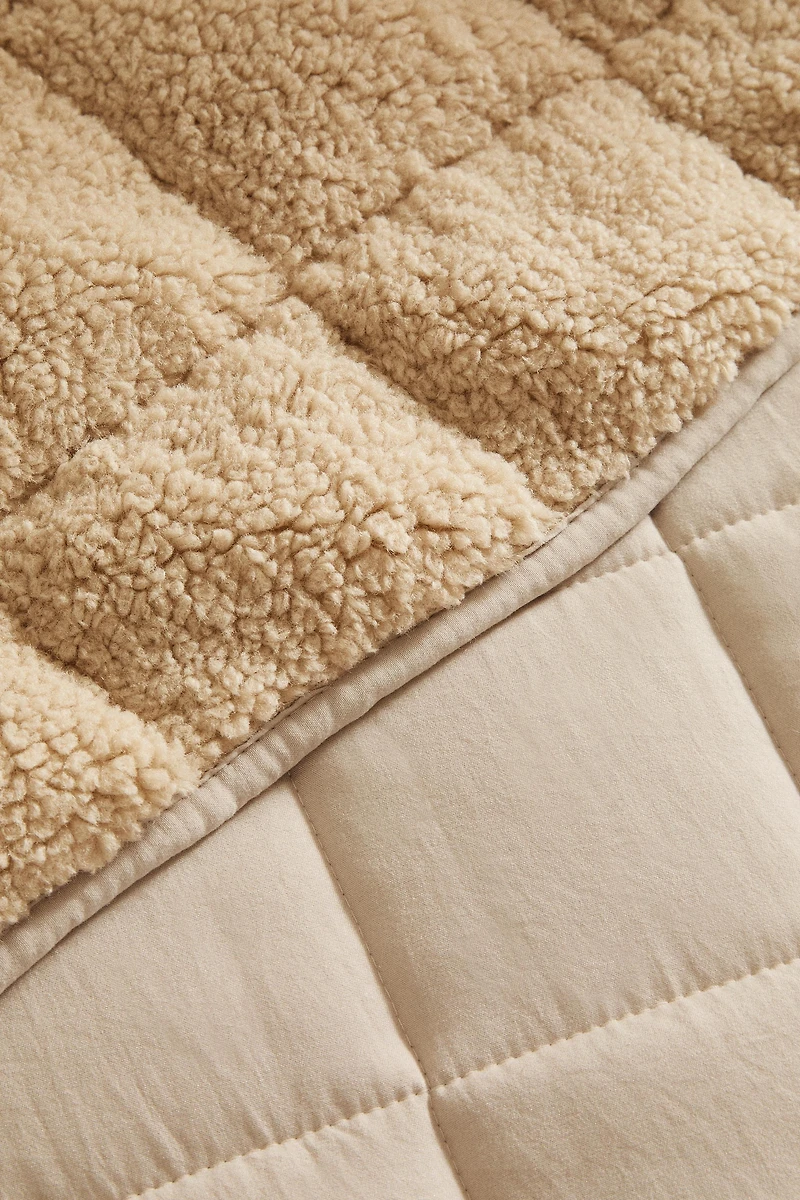 REVERSIBLE FAUX SHEARLING QUILT