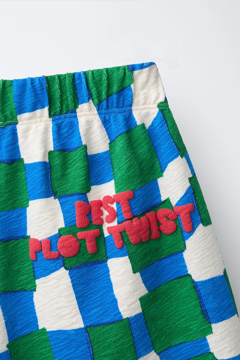 CLARA CEBRIAN © PLAID SHORTS